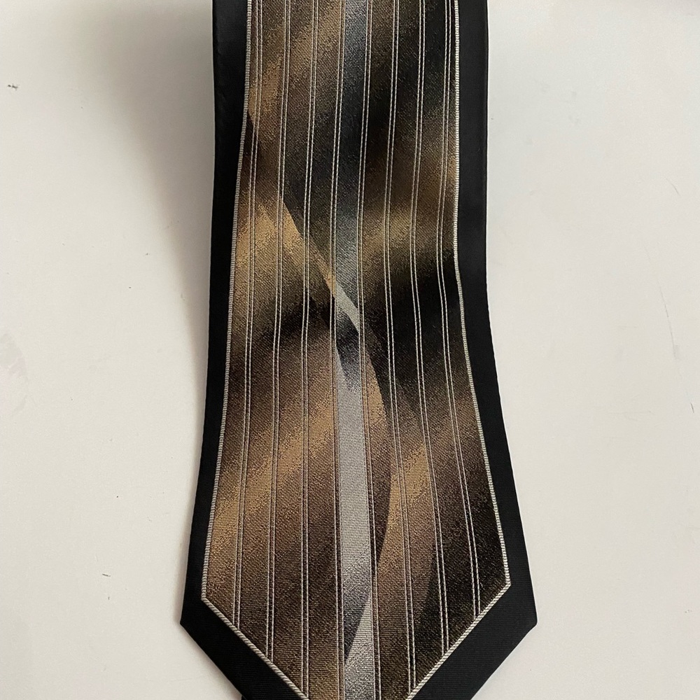 Preowned Mens “Gasparo” Necktie. Color is Black/Brown/Gold/Silver. 100%Silk